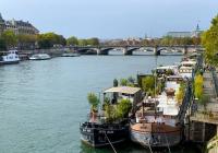 houseboats with plants along the river Seine in Paris