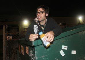 David Giles in dumpster