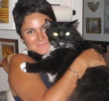 Maria Elena Garcia with cat
