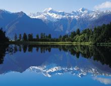 New Zealand mountains overlooking a pristine valley lake