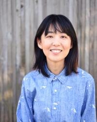 Frontal shot of Ellen Chang in light blue shirt with white dinosaur print
