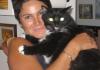 Maria Elena Garcia with cat